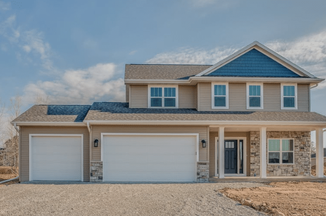 Big house with a garage door