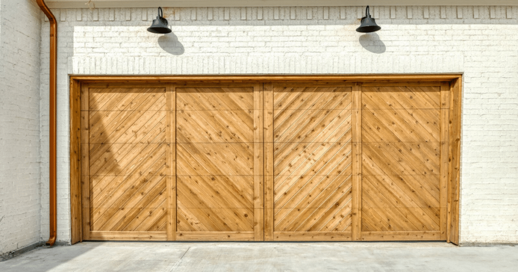 Modern wooden garage door with chevron pattern.